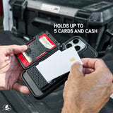 Black MagSafe wallet with red card slots attached to iPhone showing credit cards and cash storage capacity.