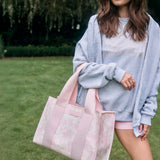 Model with tote #color_ballet pink afternoon rosé