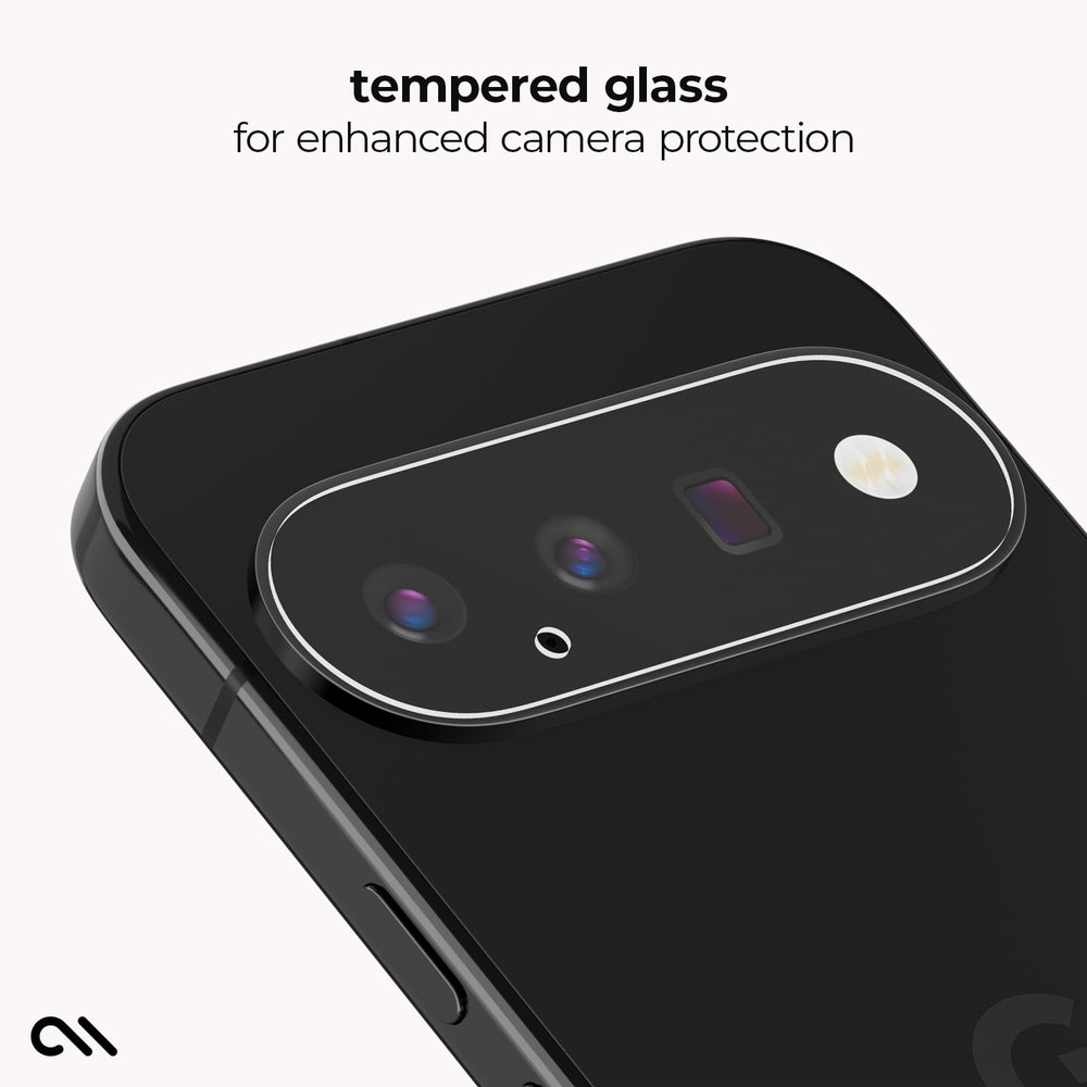 Close-up of the back of a black smartphone showing a raised camera surround with a clear tempered glass protector. Text at the top reads 'tempered glass for enhanced camera protection' on a light gray background.