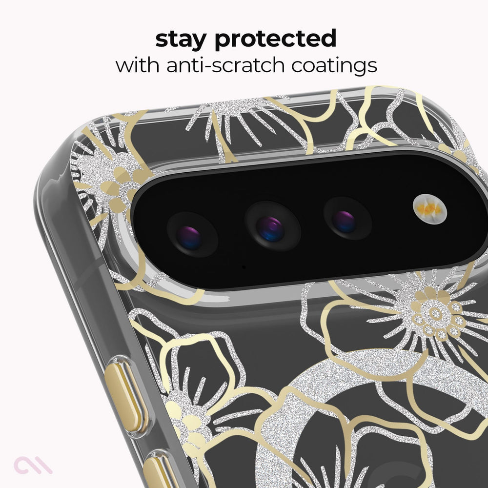 A close-up of a smartphone case with a black background and large silver and gold floral line-art pattern. The image includes text at the top reading 'stay protected with anti-scratch coatings' and shows part of the phone camera module through the case.
