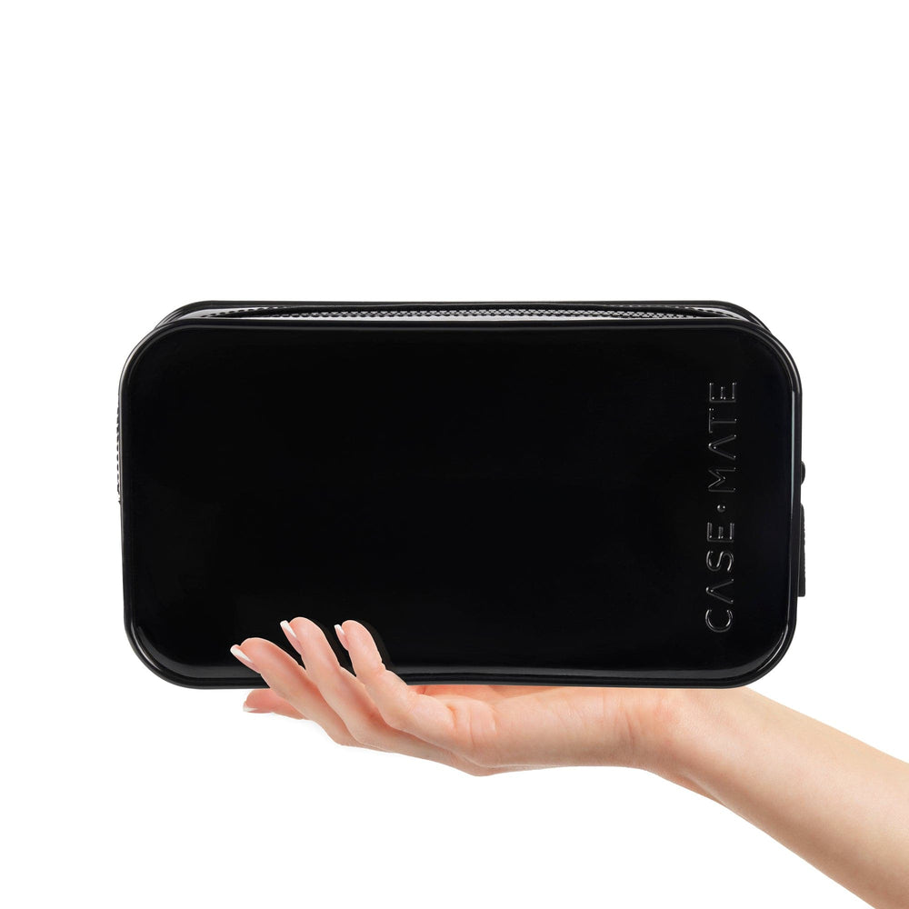Black recangular pouch with 'Case.Mate' branding held by a hand on a white background
#color_midnight black
