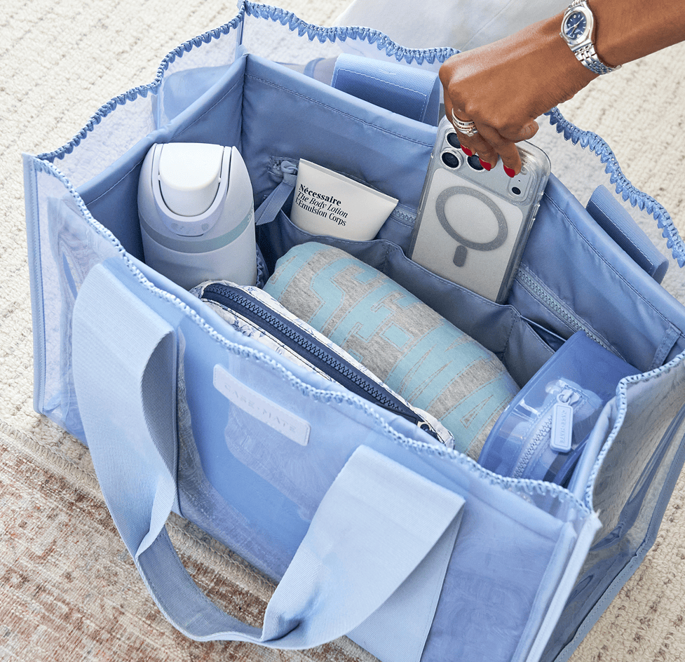 The jelly tote folded flat inside a suitcase