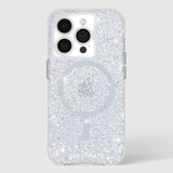 Clear iPhone 15 Pro case with iridescent glitter and sparkles throughout, showing triple camera lens cutouts and MagSafe ring