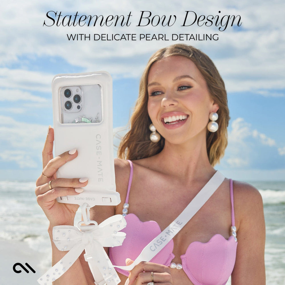 STATEMENT BOW DESIGN WITH DELICATE PEARL DETAILING #color_ivory pearl bow