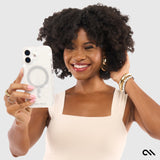 WOMAN HOLDING THE Sheer Twinkle Silver MagSafe PHONE CASE FOR iPhone 17

