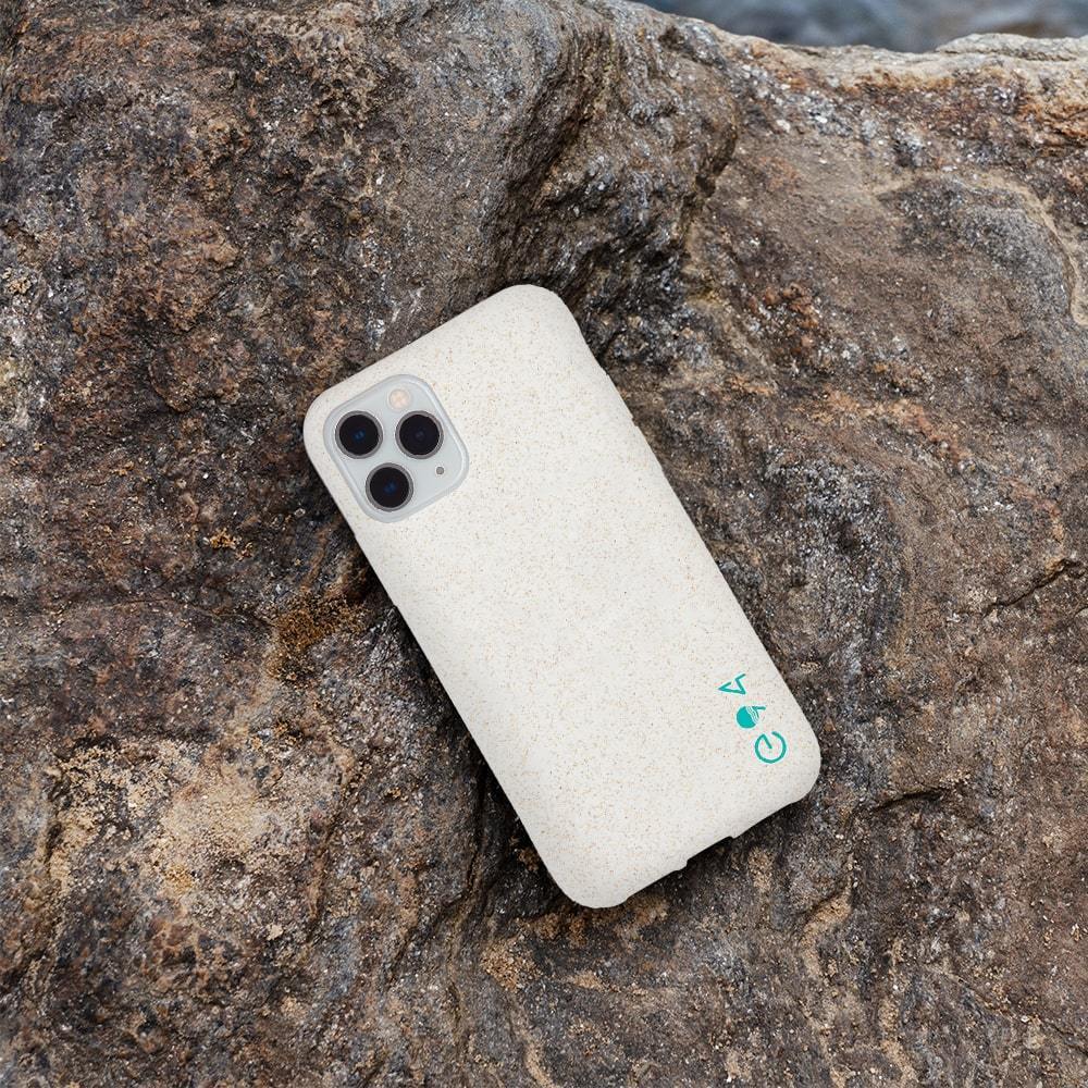 ECO 94 Biodegradable iPhone 11 Pro case sitting on rock. color::Natural