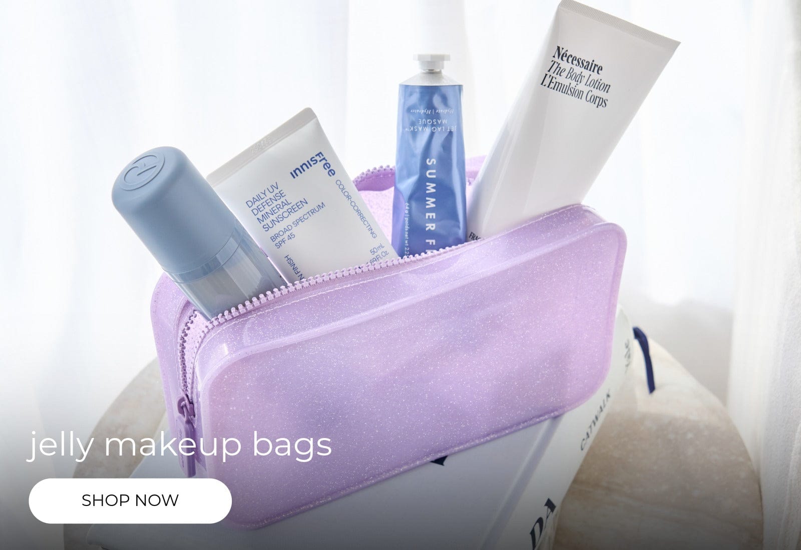 Jelly Makeup bag with sunscreen and other cosmetics inside