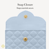 Light blue quilted wallet with gold snap closure on a white background #color_blue filigree
