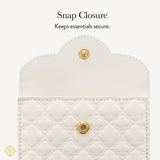White quilted wallet with gold snap closure on a light gray background

#color_Ivory Filigree