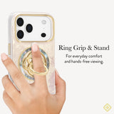 A hand holding a phone case with a gold-trimmed camera surround and a large metallic ring grip on the back, with text reading 'Ring Grip & Stand' and a small logo in the lower right on a light gray background.
#color_black mother of pearl