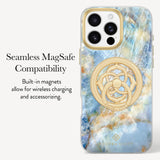 A clear phone case with a blue and white marble pattern, featuring a built-in gold-tone MagSafe ring and a circular gold logo at the bottom. The left side of the image contains text reading 'Seamless MagSafe Compatibility' and 'Built-in magnets allow for wireless charging and accessorizing.