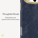 Close-up of a phone case detail with text reading 'Thoughtful Details' and 'Tactile buttons and a precise camera control cutout.' The case has a dark navy marbled back, a gold camera ring, and metallic side button accents.