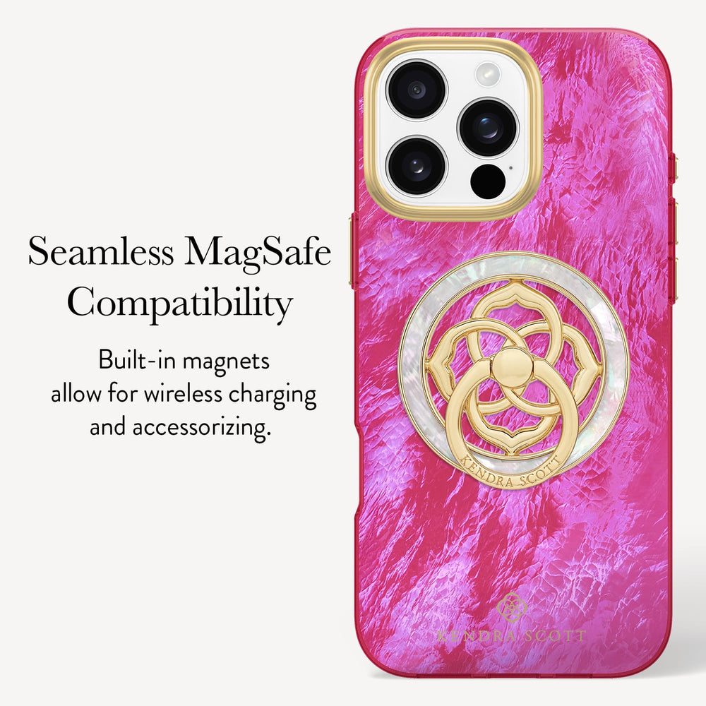 A pink marbled phone case with a gold-toned MagSafe ring and text on the left reading 'Seamless MagSafe Compatibility' and 'Built-in magnets allow for wireless charging and accessorizing.'.