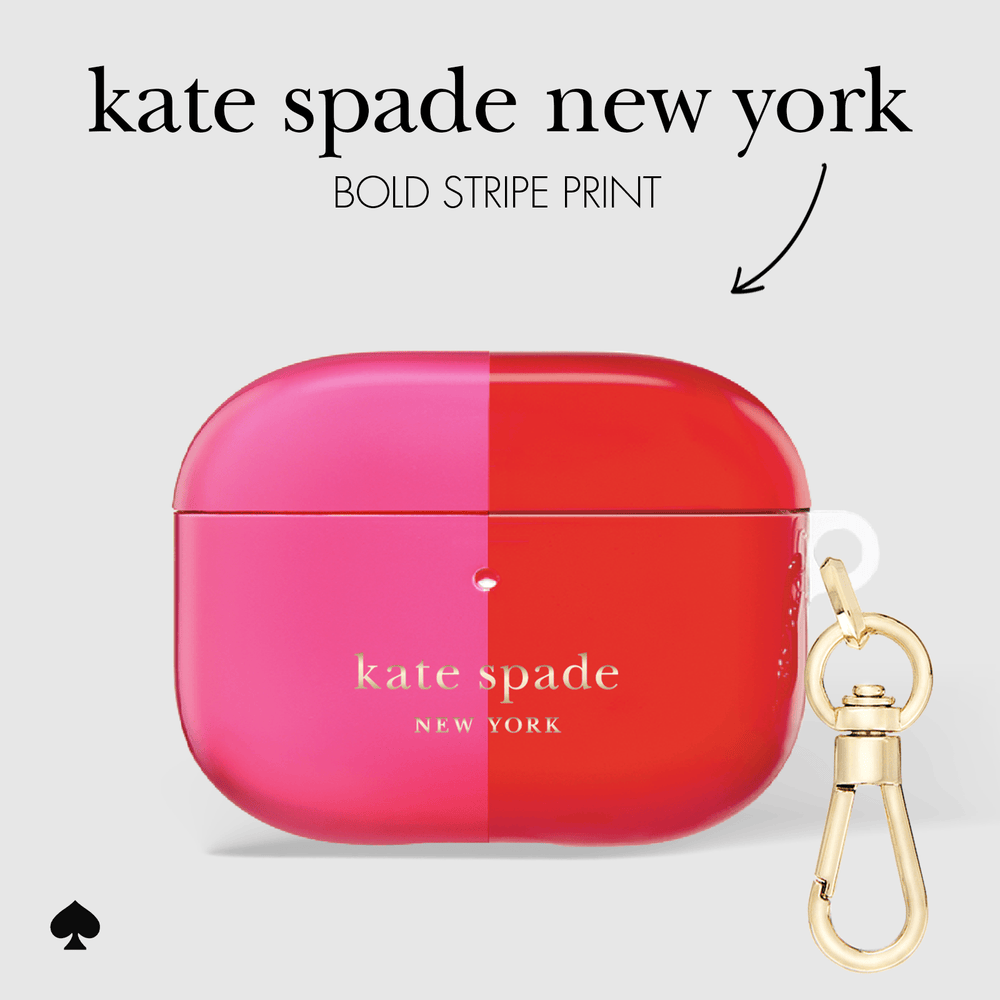 Kate Spade New York AirPods case featuring a bold vertical split design in vibrant pink and red, with a gold-tone clasp attached on the right side. The image includes text overlay reading 'kate spade new york' and 'BOLD STRIPE PRINT' on a light gray background.