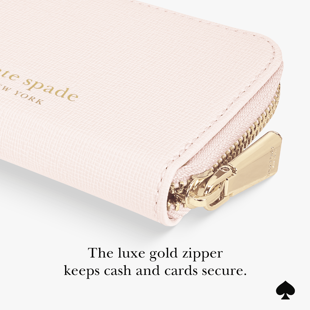The luxe gold zipper keeps cash and cards secure 