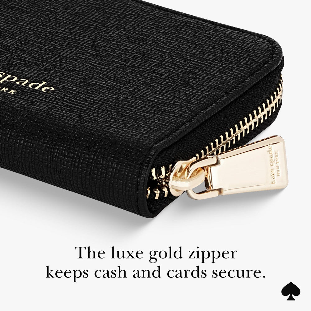 The luxe gold zipper keeps cash and cards secure