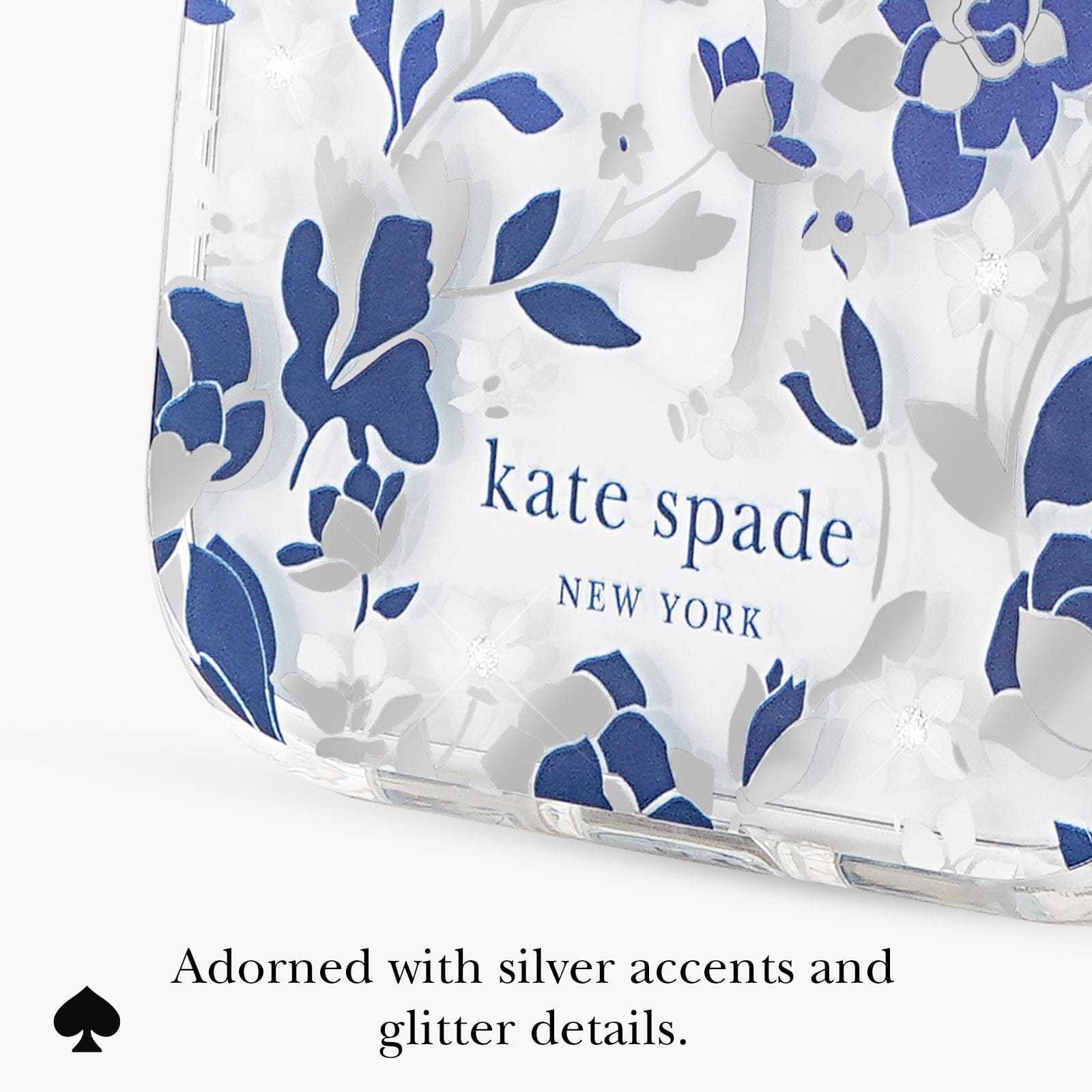 Adorned with silver accents and glitter details.