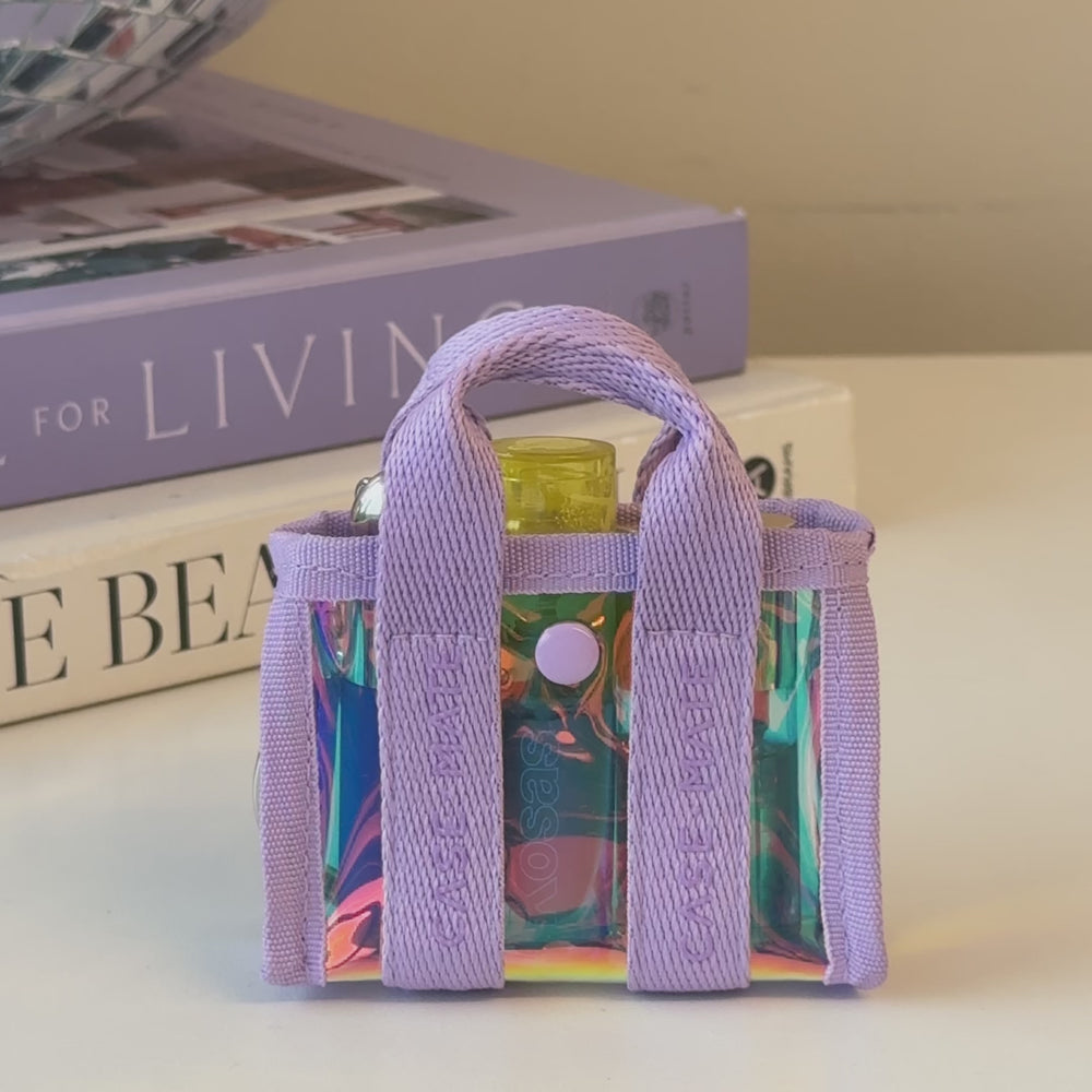 A video showing the size of the tini tote #color_iridescent