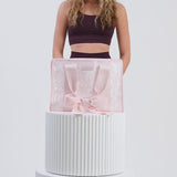 Packing Afternoon Rose Bow Jelly Tote with accessories 
#color_ballet pink afternoon rosé bow