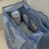 Showcase video showing the case-mate jelly tote organizer in carolina blue packing full of items
#color_carolina blue