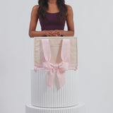 A video of a case-mate canvas tote being packed
#color_ballet pink bow