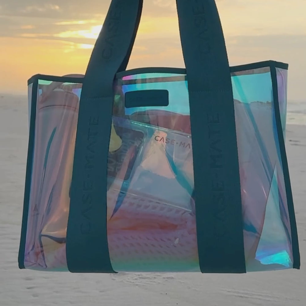 Emerald soap bubble jelly tote bag with a beach sunset and packing tote bag to show what all can fit into it  #color_emerald blue iridescent