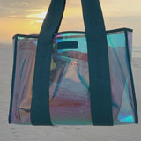 Emerald soap bubble jelly tote bag with a beach sunset and packing tote bag to show what all can fit into it  #color_emerald blue iridescent