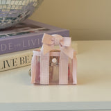 A video showing the size of the ballet pink bow tini tote #color_ballet pink bow