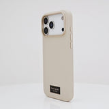 Rotating iPhone 17 showcasing Kate Spade Icon Perfect Beige Case