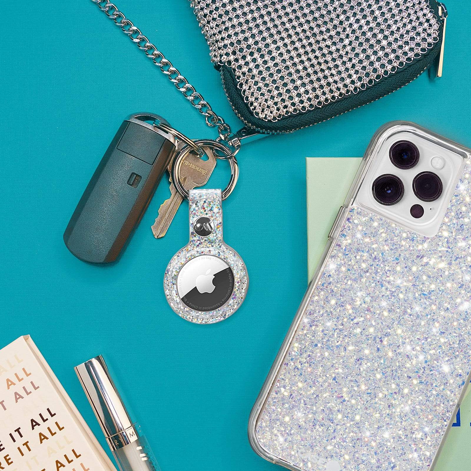 AirTag Keychain Case attached to purse and car keys. color::Sparkle