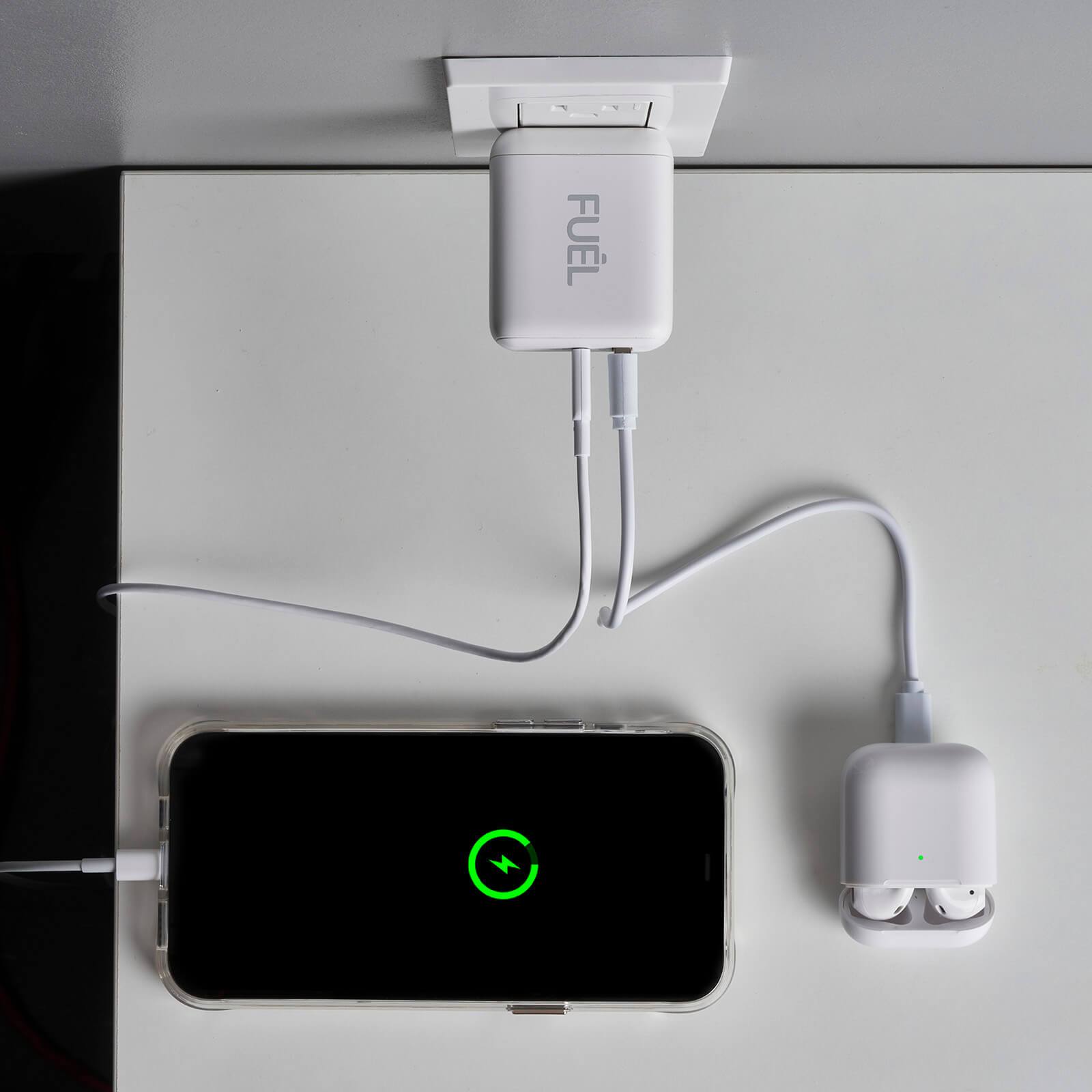 Charging iPhone and AirPods at once. color::white