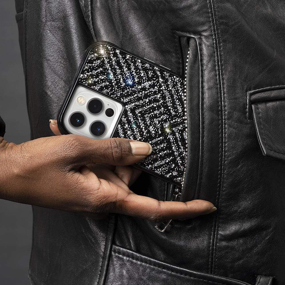 Black rhinestone phone case being pulled out of leather jacket pocket. color::Black