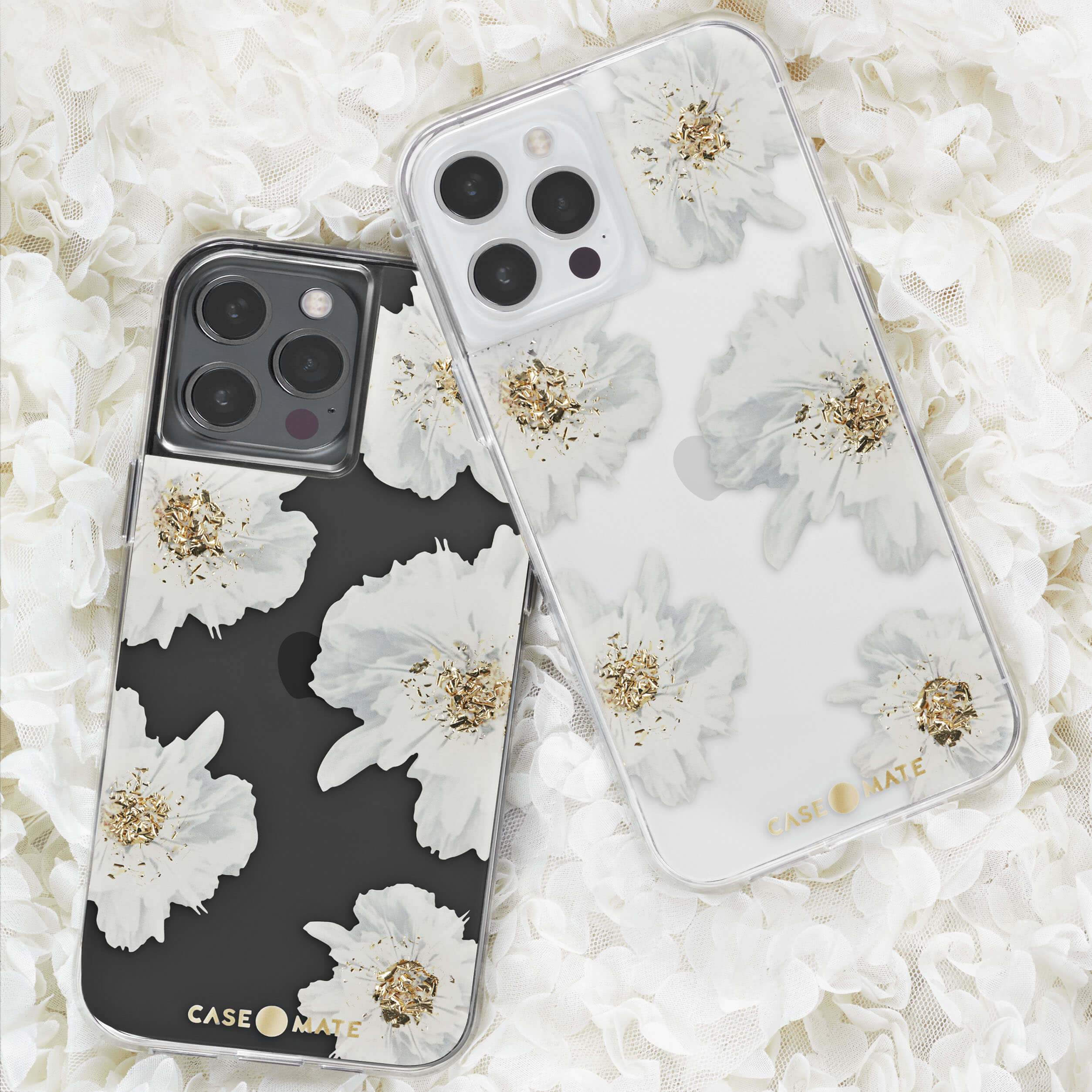 White and gold floral case shown on graphite and silver phones. color::Karat Floral