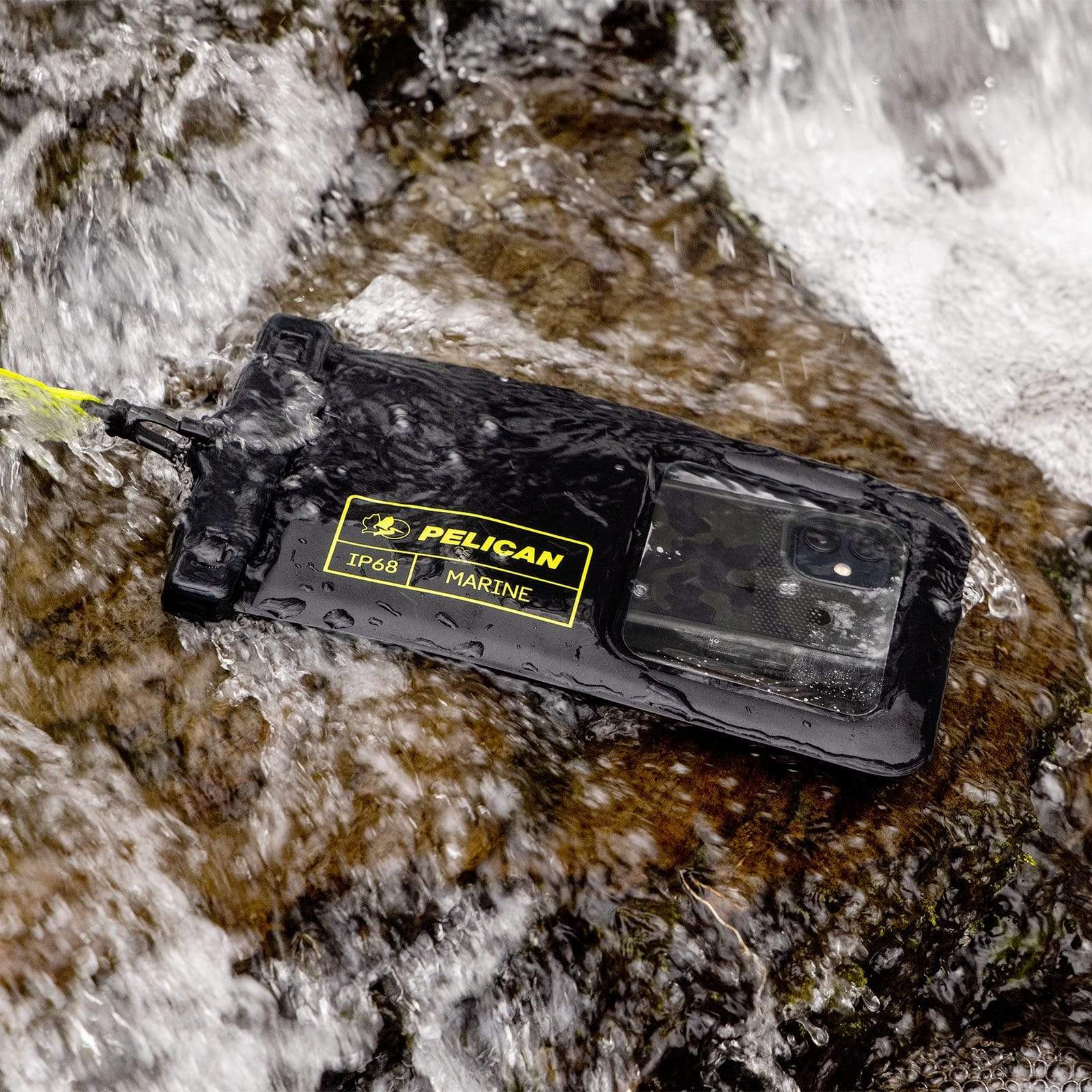 Waterproof pouch submerged in water. color::Black/Hi Vis Yellow