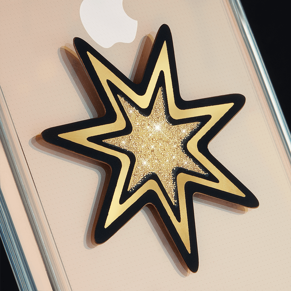 Magnetic car charm stuck to iPhone case. color::Gold Star