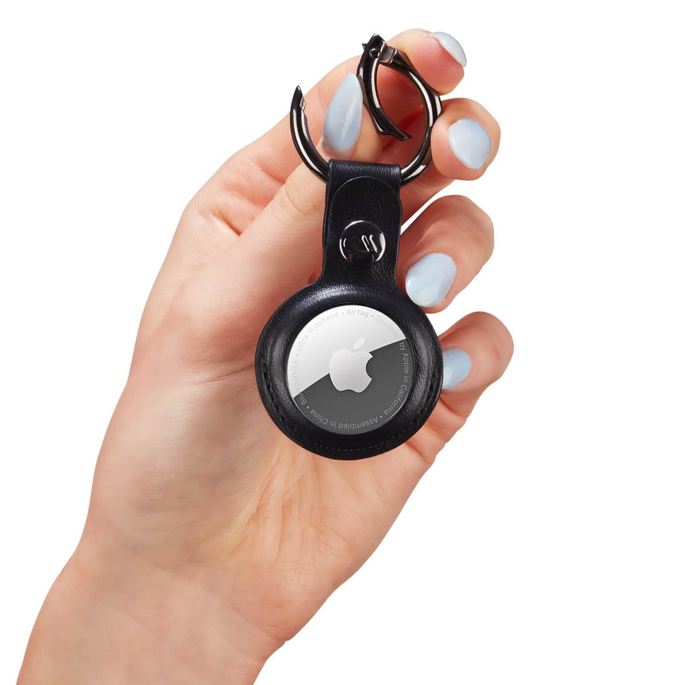 AirTag Keychain Case slightly open. color::Black