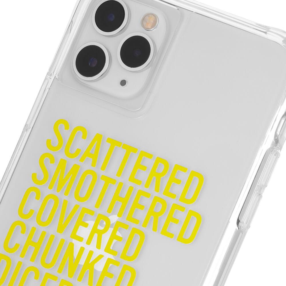 Close up of yellow text on case. color::Hashbrowns Clear