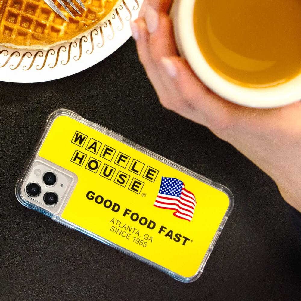 Waffle House name tag inspired case sitting on table at waffle house. color::Name Tag