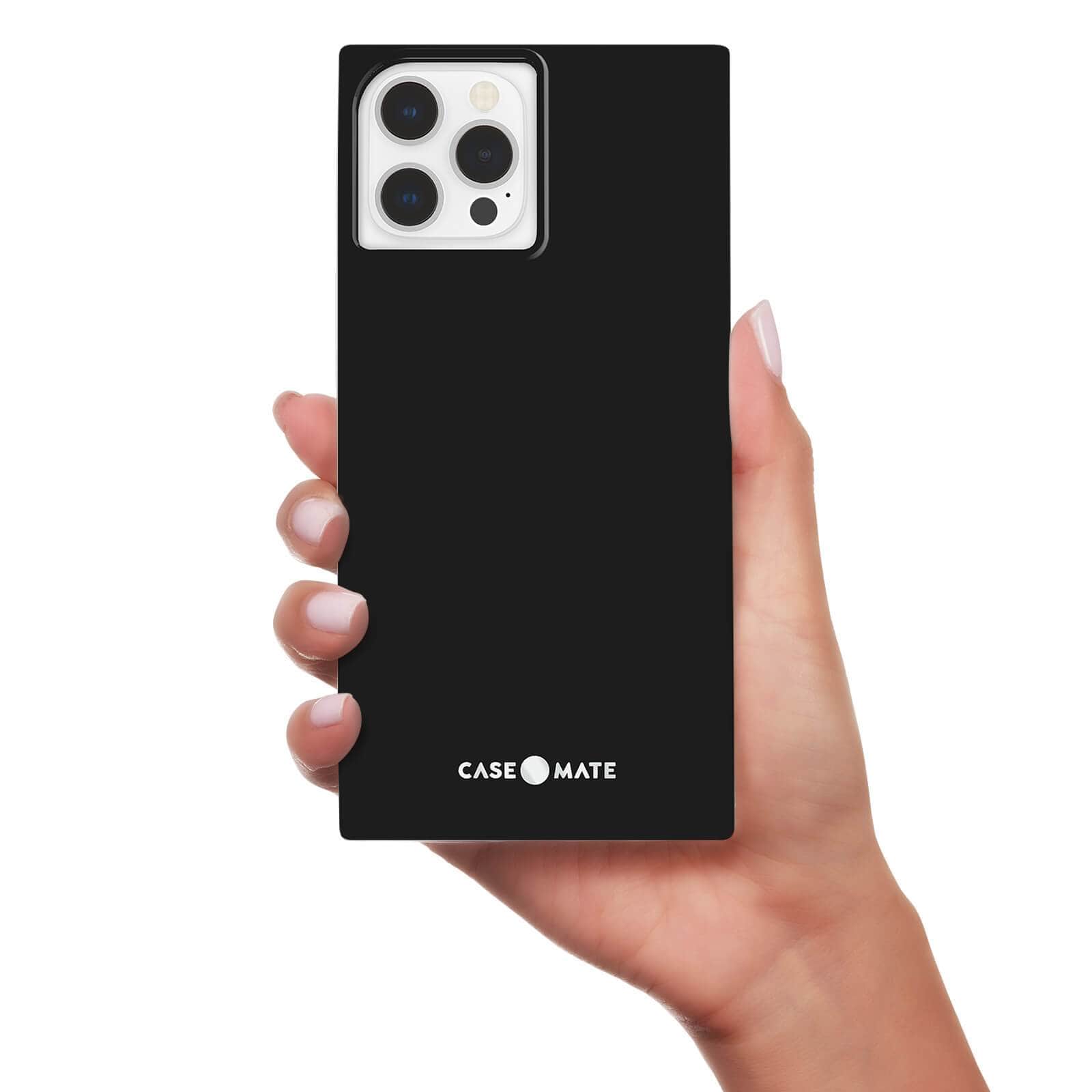 Hand Holding Black BLOX square case. color::black