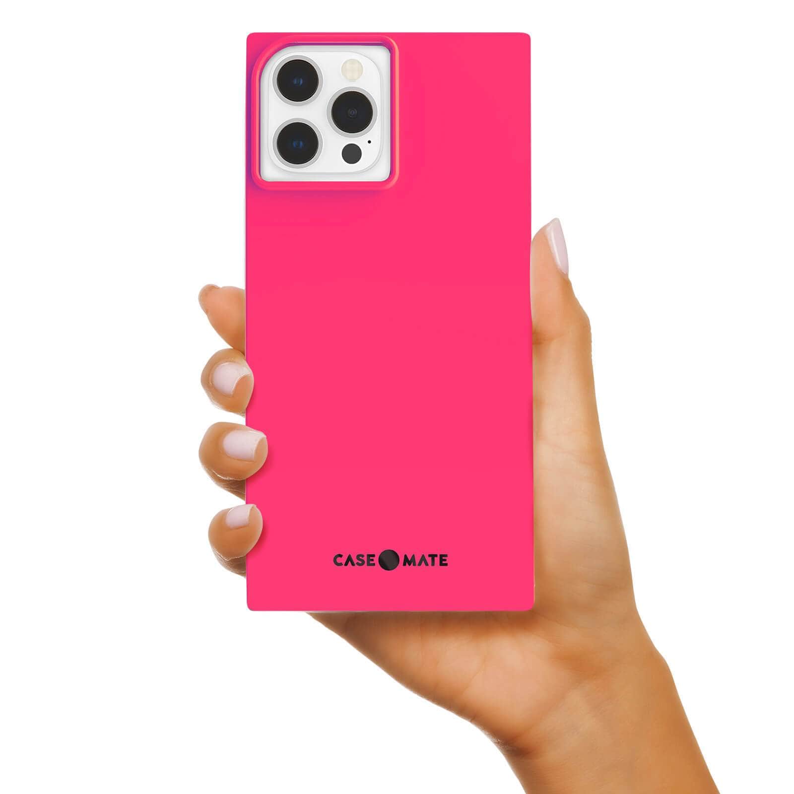 Hand holding BLOX square case. color::Hot Pink