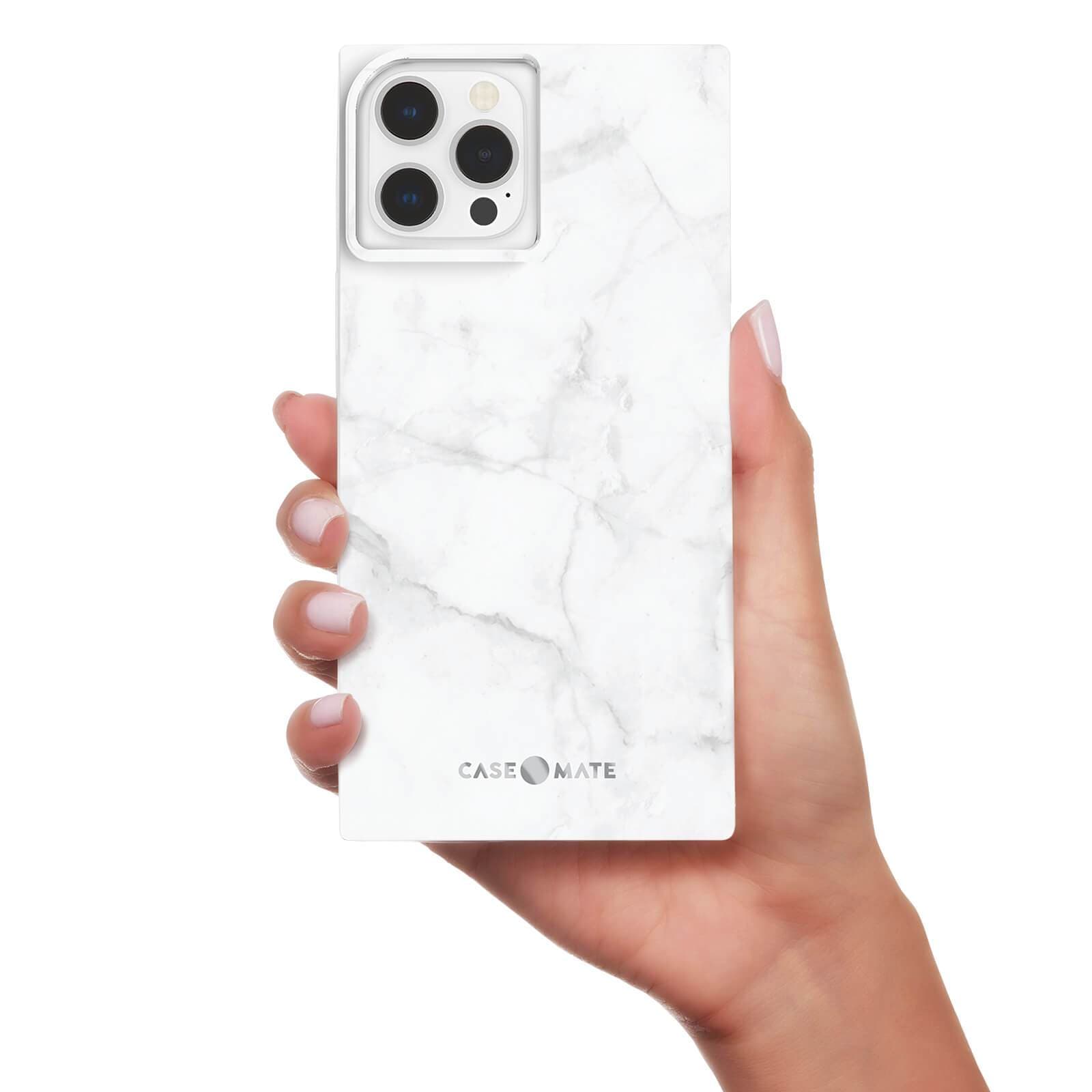 Hand holding rectangular White Marble BLOX case. color::White Marble
