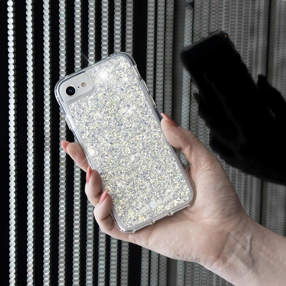 Hand holding sparkly case for iPhone SE/ 8/ 7 color::Twinkle Stardust