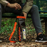 Pelican dry bag with hunter camo pattern, orange strap, holding smartphone visible through clear window panel.